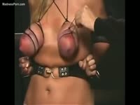 Bodacious babe has her huge melons abused while trapped in BDSM restraints